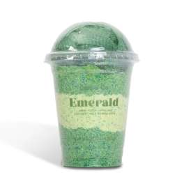 Green bubble bath in a clear plastic cup with a dome lid