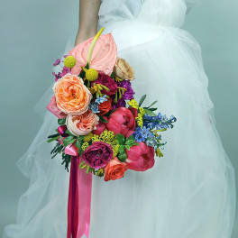 Colorful bridal bouquet with roses, peonies, and anthurium
