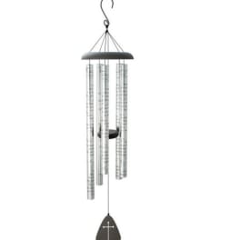 Silver metal wind chime with printed text and black sail featuring a white cross