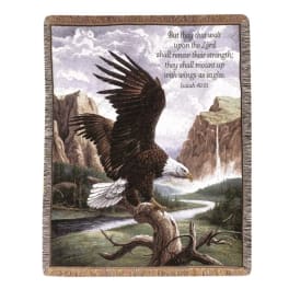 Woven throw blanket with a soaring bald eagle over a mountain landscape and scripture text