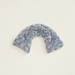 Gray fuzzy U-shaped plush item on a plain background