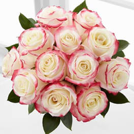 Bouquet of white roses with pink-edged petals
