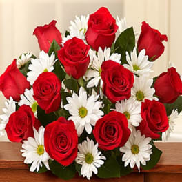 Bouquet of red roses and white daisies
