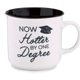 White mug with black rim and graduation text