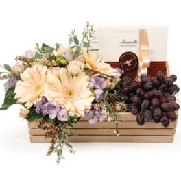 Gourmet and Floral Basket By Flower Carriage