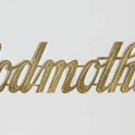 Gold script word "Godmother" on a white background