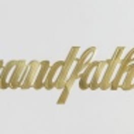 Gold script reading "Grandfather" on a white background