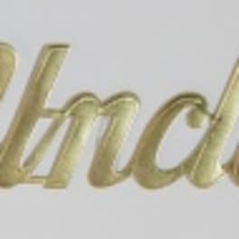 Gold script reading "Uncle" on a white background