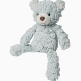 Light blue plush teddy bear with a white snout on a white background