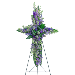 Purple and white floral standing cross on a metal easel