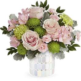 Pink roses and green mums in a patterned vase