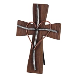 Wooden cross with a wire heart on a white background
