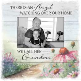 Memorial plaque with a grandmother and child photo and floral artwork