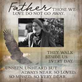 Memorial plaque with a man’s photo, eagle, and sympathy quote