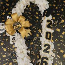 White grad lei