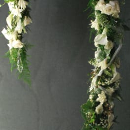 Long white floral garland with roses and calla lilies