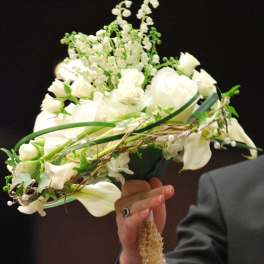 White bridal bouquet with roses, calla lilies, and lily of the valley