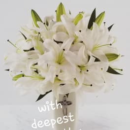 White lily bouquet with a ribboned handle