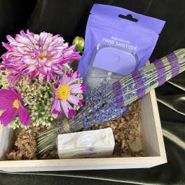 Gift box with mixed flowers, lavender bundle, soap, and hand sanitizer