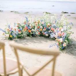 Sand and Flowers arch