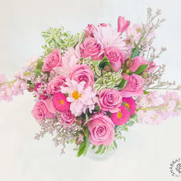 Pink rose bouquet with daisies and small filler flowers