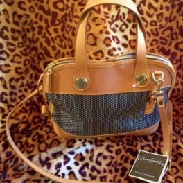 Tan handbag with a leopard-print background