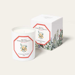 White candle in a glass jar with a matching box