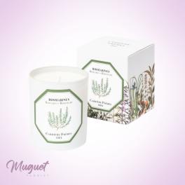White rosemary-scented candle in a box with botanical artwork