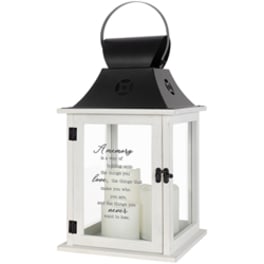 White decorative lantern with a candle inside