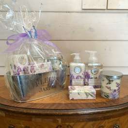 Gift basket with lavender bath products and a candle