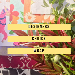 Colorful floral wrap samples with greenery and bold text labels