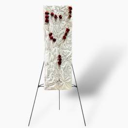 White funeral easel spray with red roses on a stand