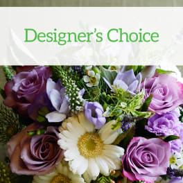 Mixed bouquet of purple and white flowers with roses and daisies