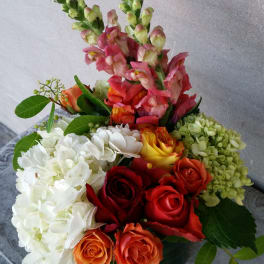 Mixed bouquet with roses, hydrangeas, and snapdragons
