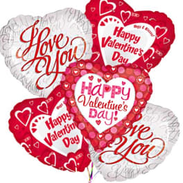 Heart-shaped Valentine’s Day balloons with red and pink designs