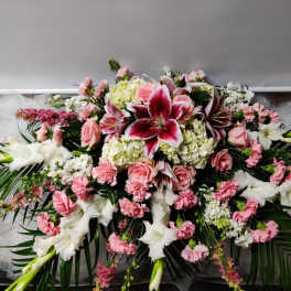 Large pink and white floral spray with lilies and roses