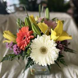 Mixed bouquet with gerbera daisies and yellow lilies