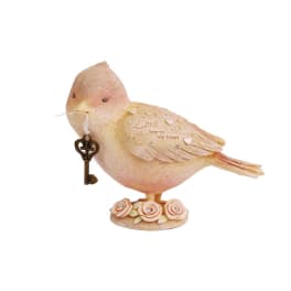 Decorative bird figurine holding a key with rose accents