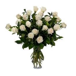 Tall arrangement of long-stem white roses in a clear glass vase