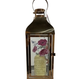 Bronze lantern with a floral memorial insert and quote