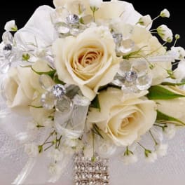 Cream rose bouquet with crystal accents and white ribbon
