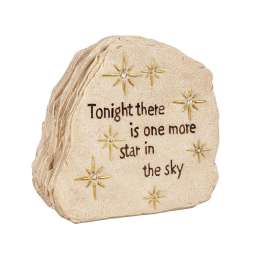 Decorative memorial stone with the words "Tonight there is one more star in the sky"