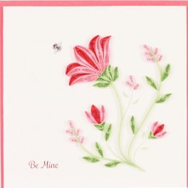 Quilled pink and red flowers with a bee on a white card reading Be Mine