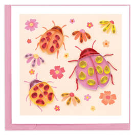 Pink greeting card with colorful paper ladybugs and flowers