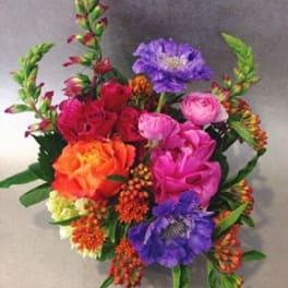Colorful bouquet with pink, orange, purple, and red flowers