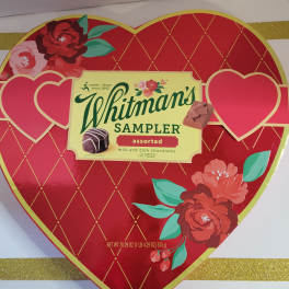 Heart-shaped Whitman's Sampler chocolate box with floral decoration