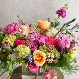 Colorful mixed bouquet in a clear glass vase