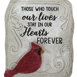 Decorative memorial plaque with a red cardinal and remembrance text