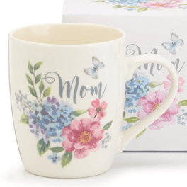 Cream ceramic mug with pastel flowers, butterflies, and the word Mom on the front
