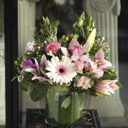 Pink and white mixed bouquet in a glass vase